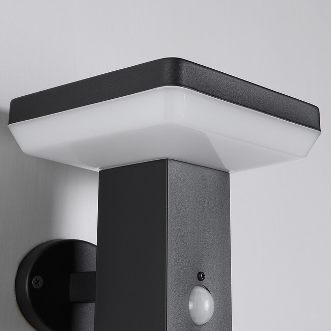 Modern solar wall light black with sensor - Aila