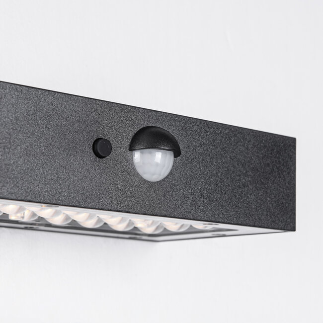 Black solar outdoor wall light with sensor - Brock