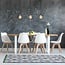 Industrial glossy black cord pendant with 5W XL G95 bulb, amber