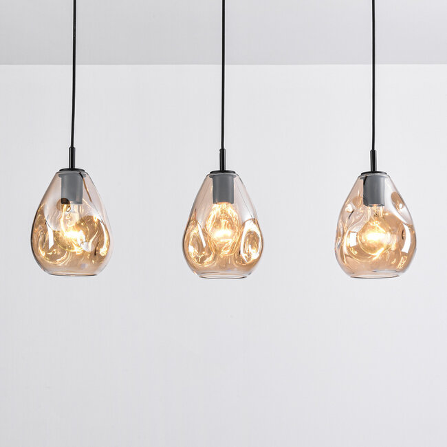 Modern pendant lamp in black with amber glass Faliste - 3-light