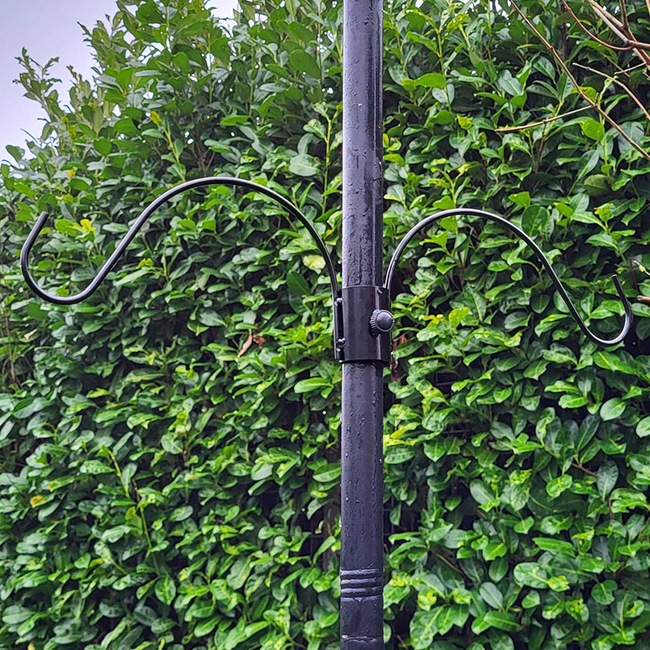 Metal ring with hanging hooks for posts