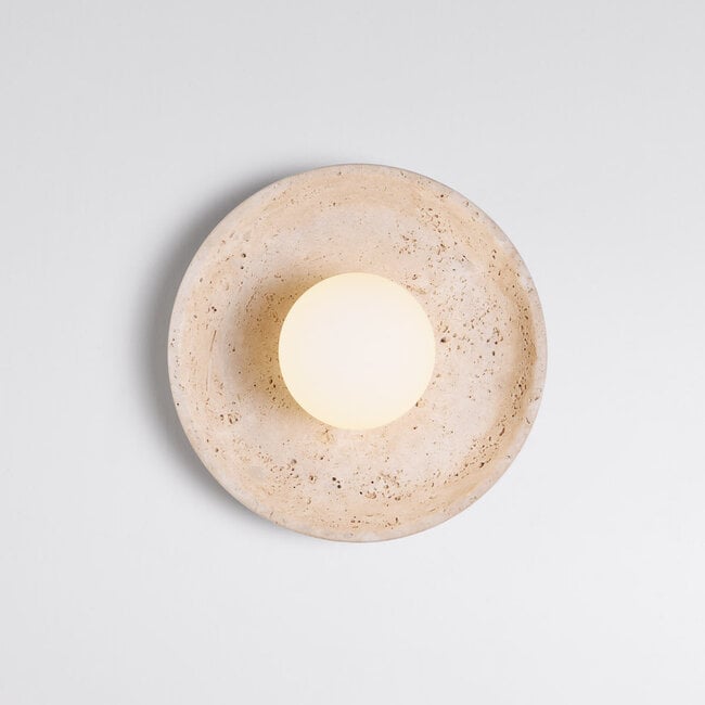 Elegant Arto wall lamp made of travertine (natural stone) and opal white glass