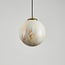 1-light pendant light Tessra with marble-effect glass and brass gold