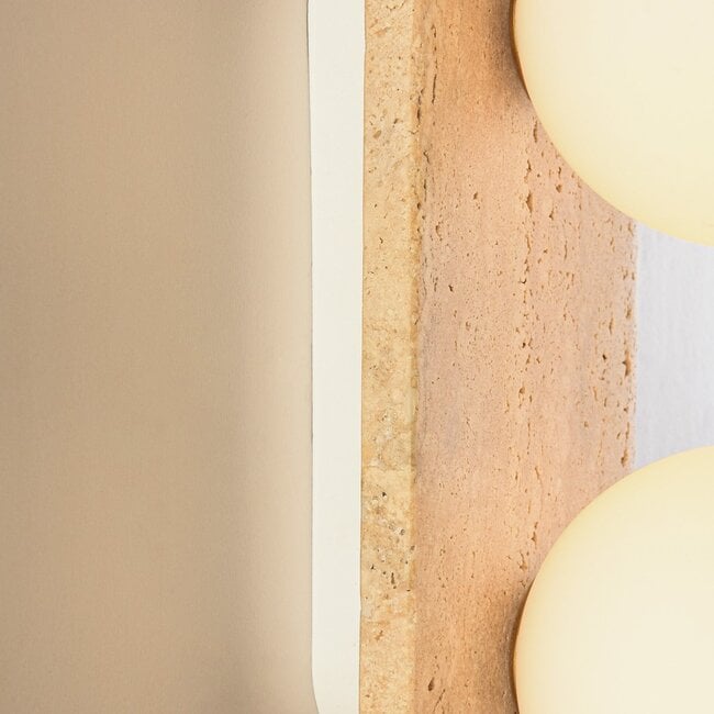 2-light wall lamp Artea in travertine (natural stone) with glass globes
