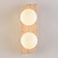 2-light wall lamp Artea in travertine (natural stone) with glass globes
