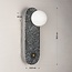 Wall lamp Vero in cement and opal-white glass with dark grey terrazzo look