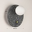 Round wall lamp Vero in cement and opal-white glass with dark grey terrazzo look