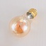 5W horizontal spiral lamp, 1800K, amber glass Ø60 - dimmable
