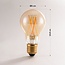 E27 A60 smart LED bulb dim-to-warm 7W amber (Tuya)