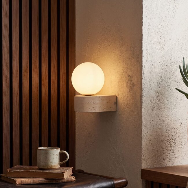 Wall light Alessa made of travertine (natural stone) with glass sphere
