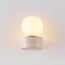 Wall lamp Alessa - travertine (natural stone) with glass globe