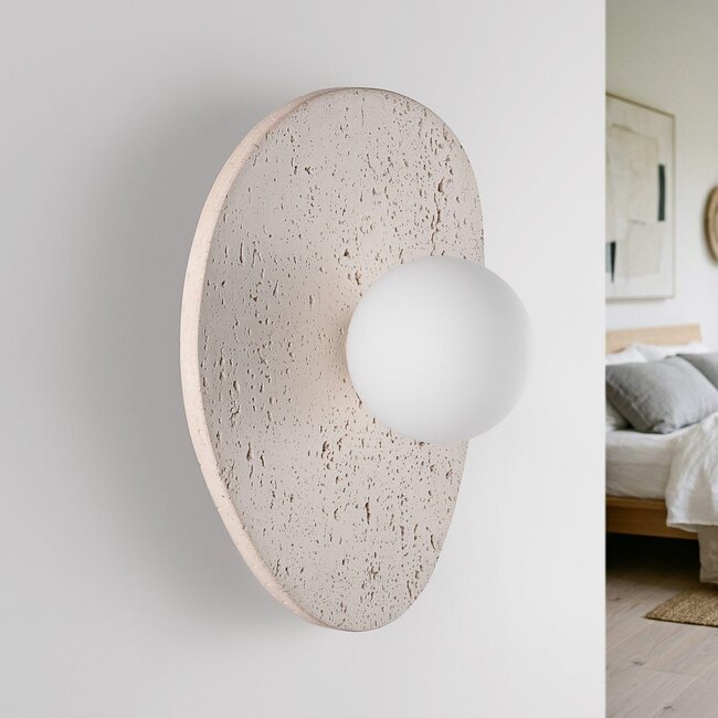 Lucio wall light in travertine (natural stone) with glass globe