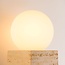 Wall lamp Emi with travertine (natural stone) and opal-white globe