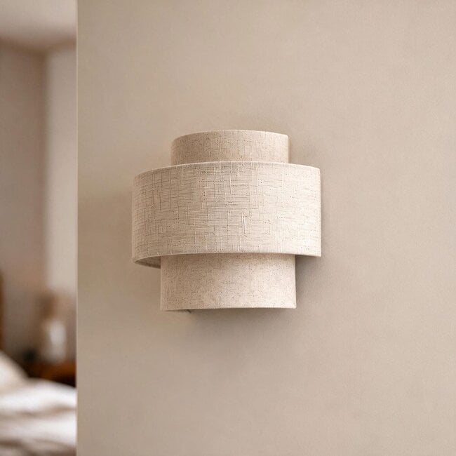 Wall light Tanja with layered fabric shade