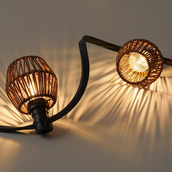 Festoon shade with a dark rattan look