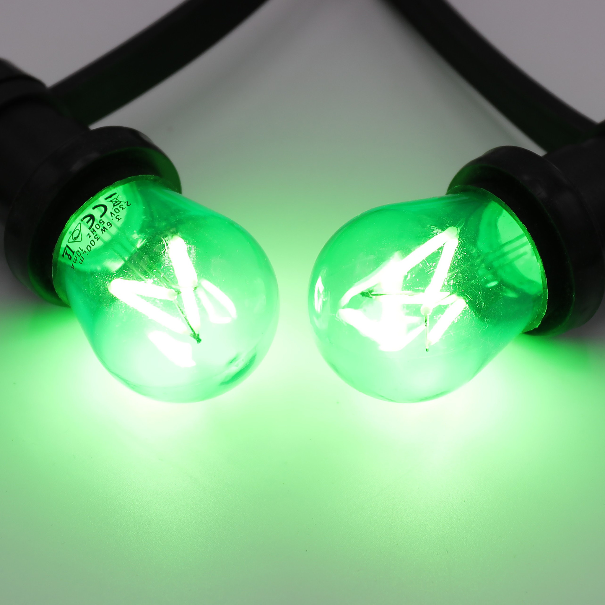 Valoketju 1W värikkäillä LED-filamenttilampuilla, himmennettävä