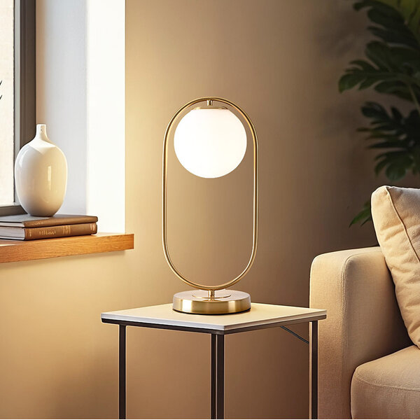Złota designerska lampa stołowa z mlecznobiałym szkłem - George