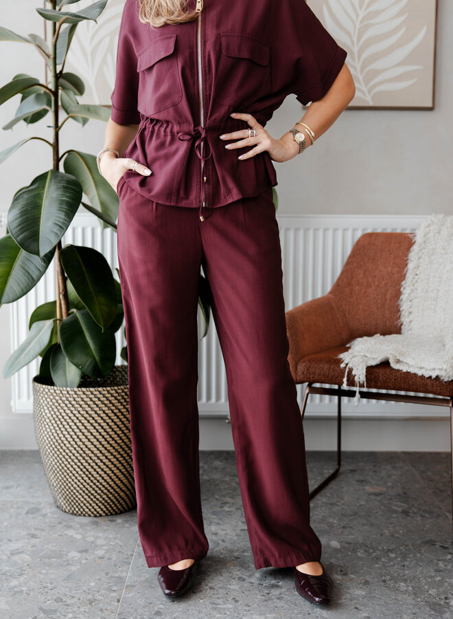 Broek met gouden knoop – Prune