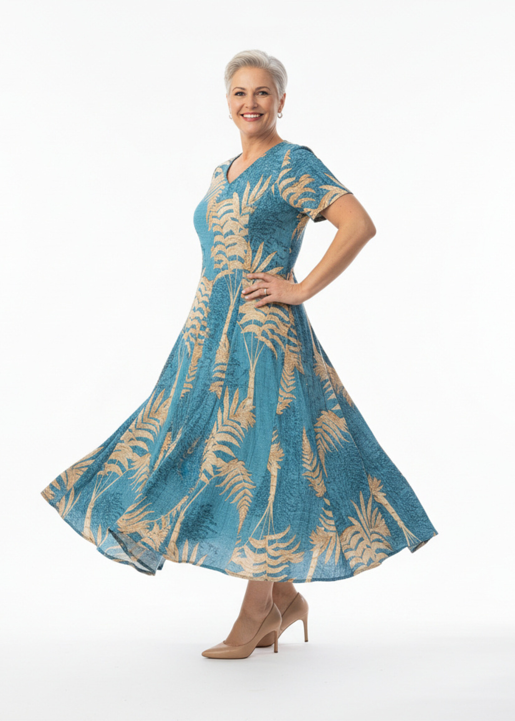 Orientique Natuurlijk, hier is de producttekst voor de Orientique Jurk Ponta Verde Godet (40203).  Op basis van de foto zie ik een prachtige, diepe blauw-groene (petrol/teal) basiskleur met een beige/goudkleurige palmbladerenprint. Het is duidelijk weer het geliefde