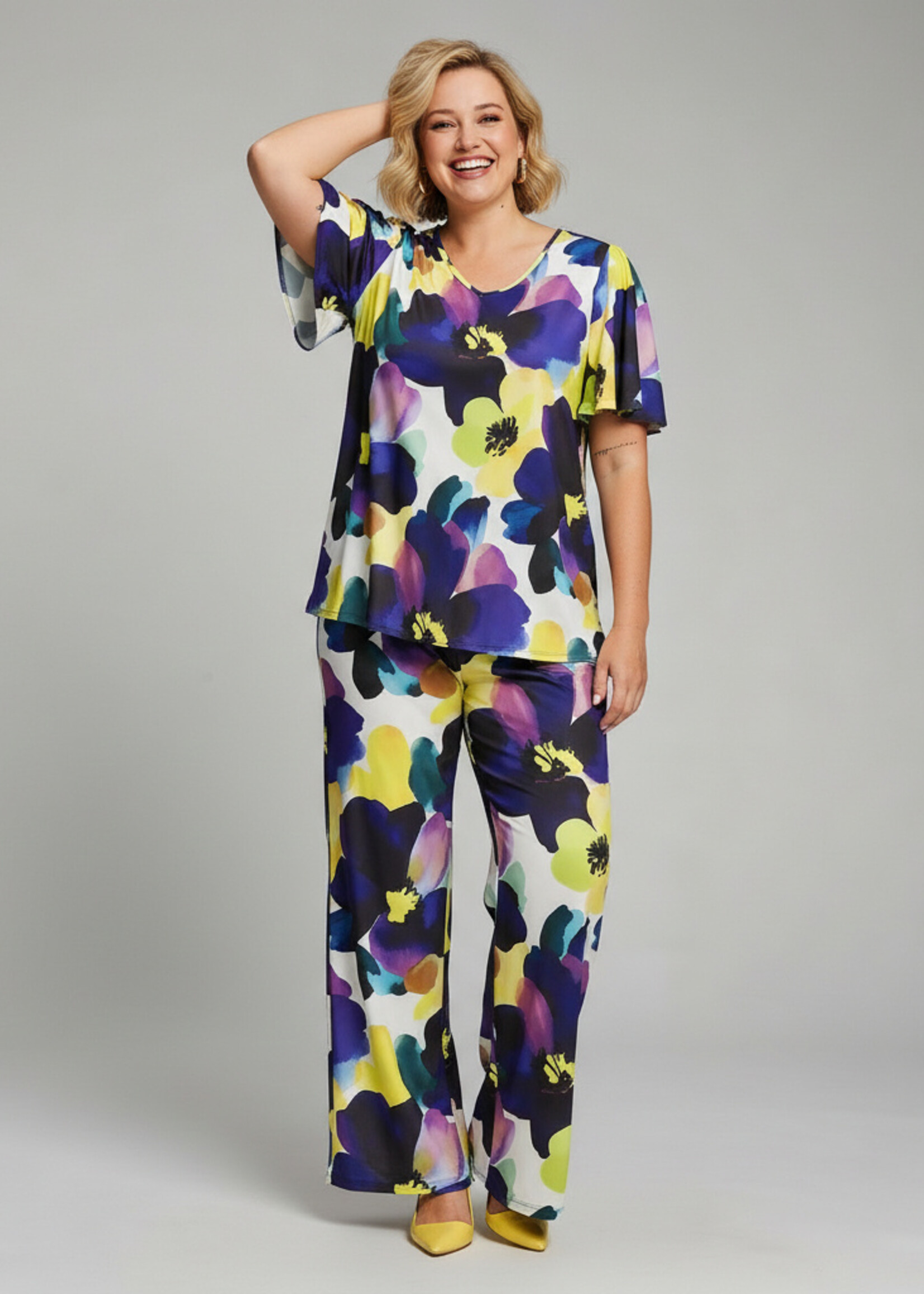 Yoek Yoek Broek Lush - Kleurrijke Pantalon met Bloemenprint in Duurzame Dolce Travelstof