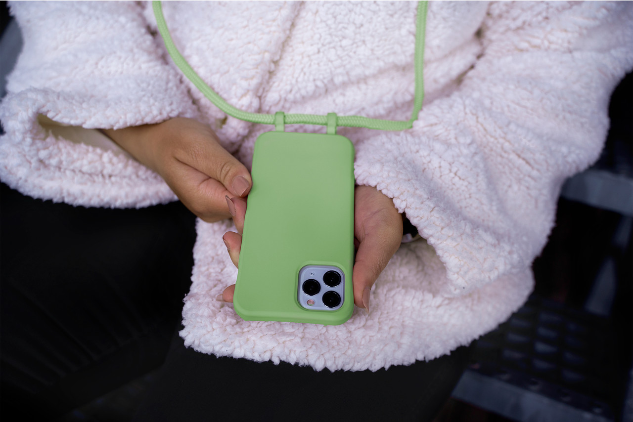 Coverzs Coverzs Silikonhülle mit Band iPhone X / Xs (Hellgrün) Coverzs Coverzs Silikonhülle mit Band iPhone X / Xs (Hellgrün)