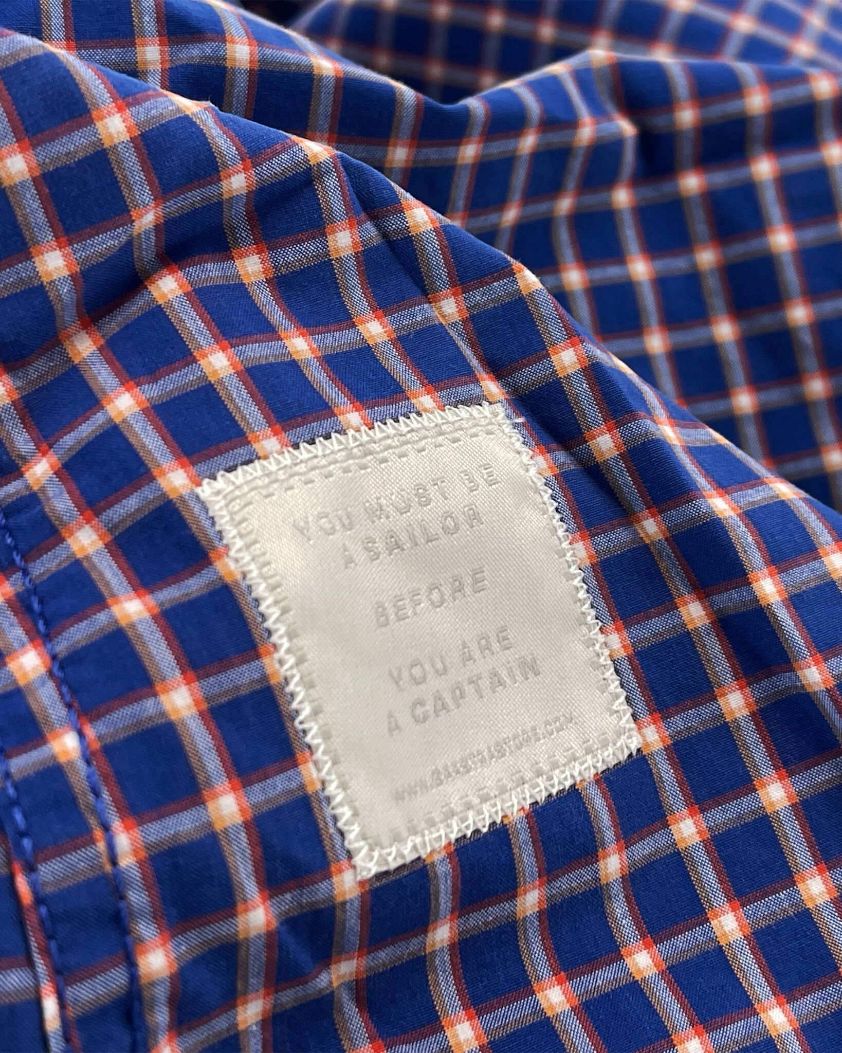 Chemise à carreaux coupe classique en coton avec col boutonné et logo sur la poitrine