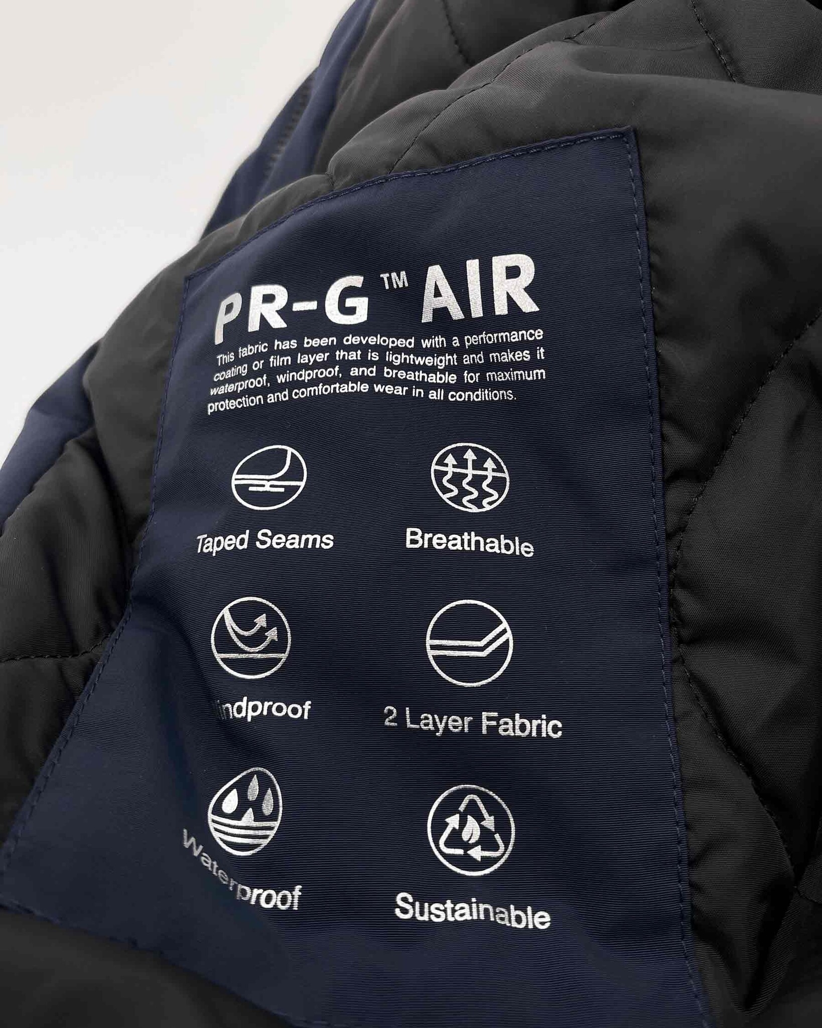 Waterproof Parka developed with a technical 2-layer fabric, detachable hood and REPREVE® padding