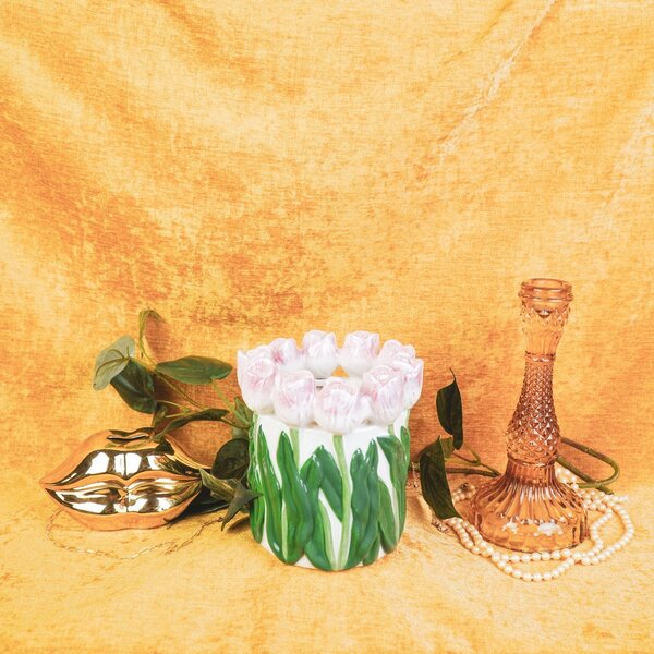 Vase avec des tulipes roses