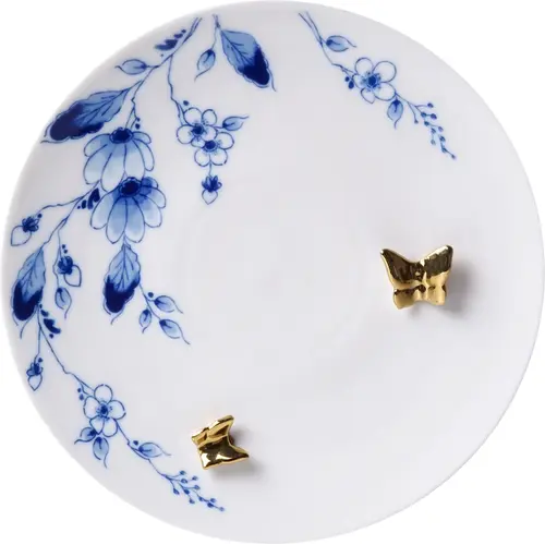 Assiette bleue de Delft ornée de papillons dorés 