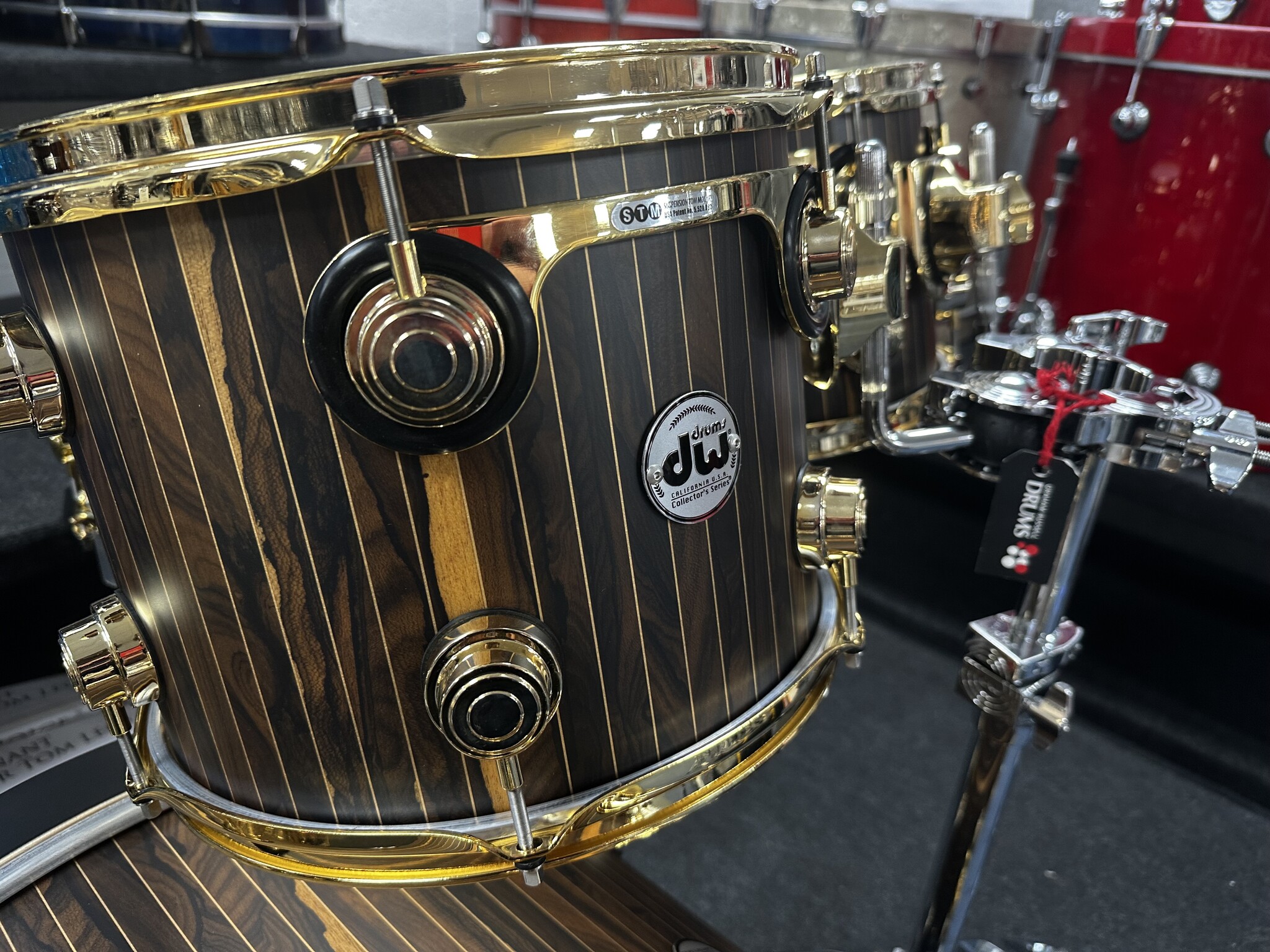 Brand New In Store! The DW Collectors Limited Edition 22" Drum Kit, In Brass Pinstripe Ziricote
