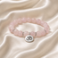 Armband Rozenkwarts met OHM Bedel