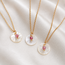 Ketting met Roze Toermalijn en Schelp - Goudkleurig