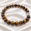 Armband Tijgeroog Boeddhahoofd 8 mm Kralen