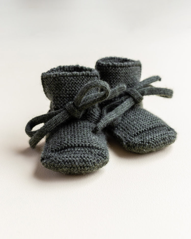 Hvid babyslofjes van merinowol pine