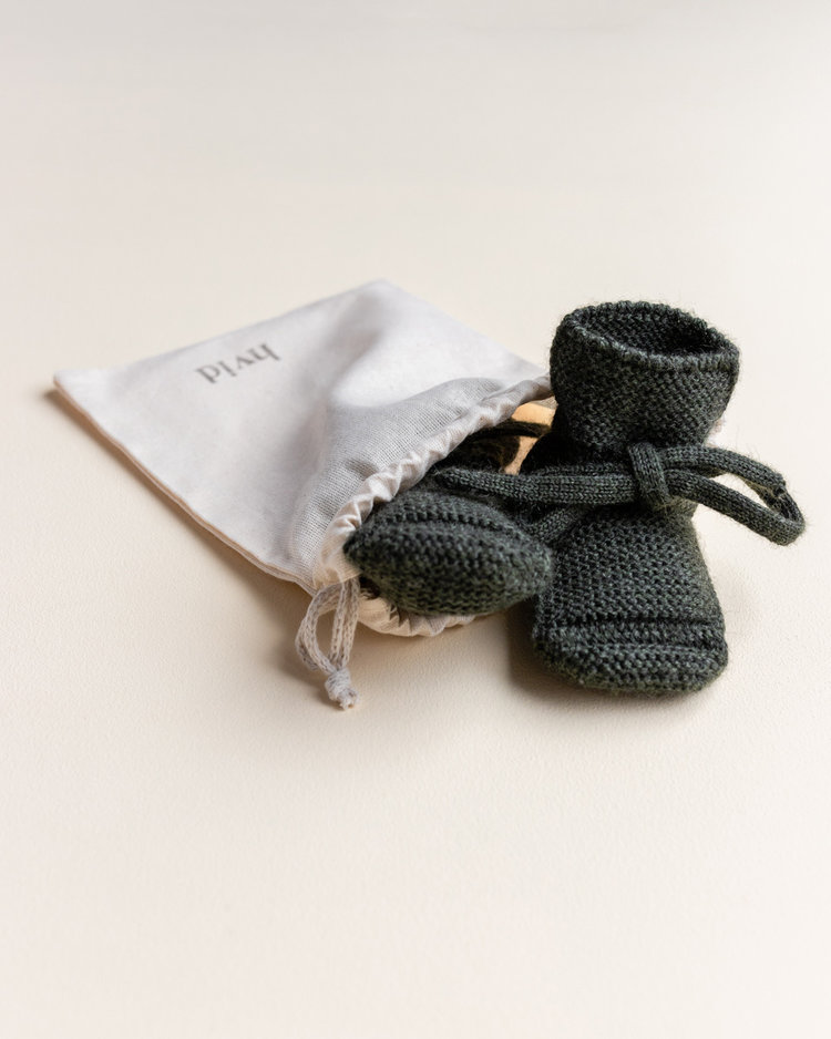 Hvid babyslofjes van merinowol pine