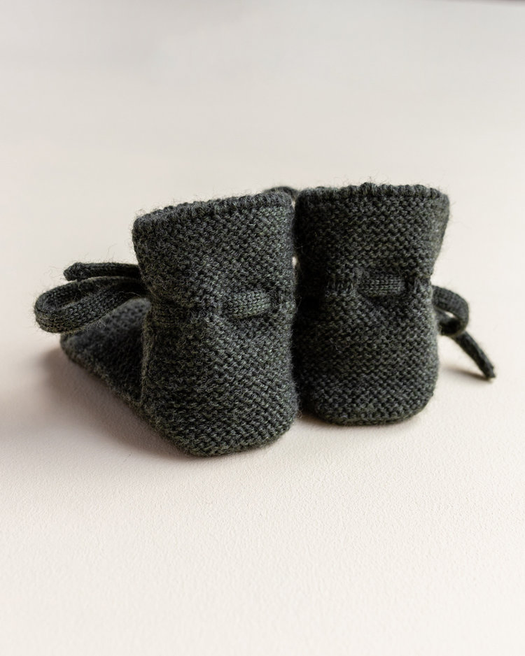 Hvid babyslofjes van merinowol pine