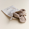 Hvid babyslofjes van merinowol zand Hvid babyslofjes van merinowol zand