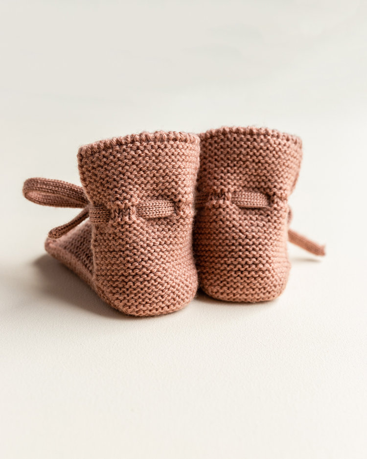 Hvid babyslofjes van merinowol terracotta