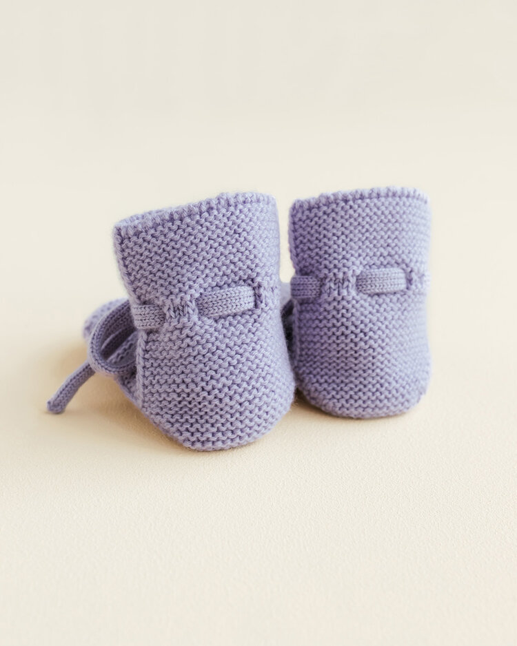 Hvid babyslofjes van merinowol lila