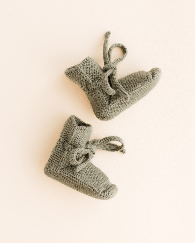 Hvid babyslofjes van merinowol groen