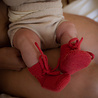 Hvid babyslofjes van merinowol roze Hvid babyslofjes van merinowol roze