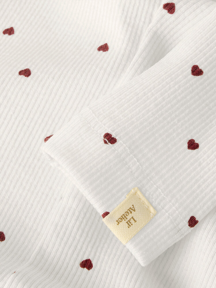 Lil Atelier legging voor baby's met hartjes print coconut milck Lil Atelier legging voor baby's met hartjes print coconut milck