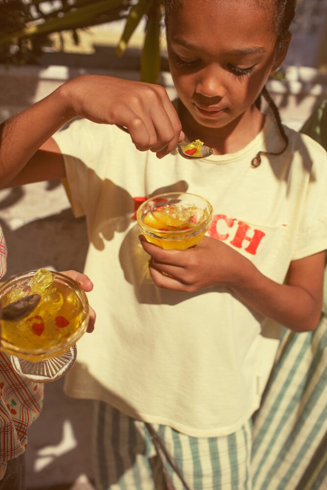 Piupiuchick T’shirt | light yellow w/ "beach bar" print