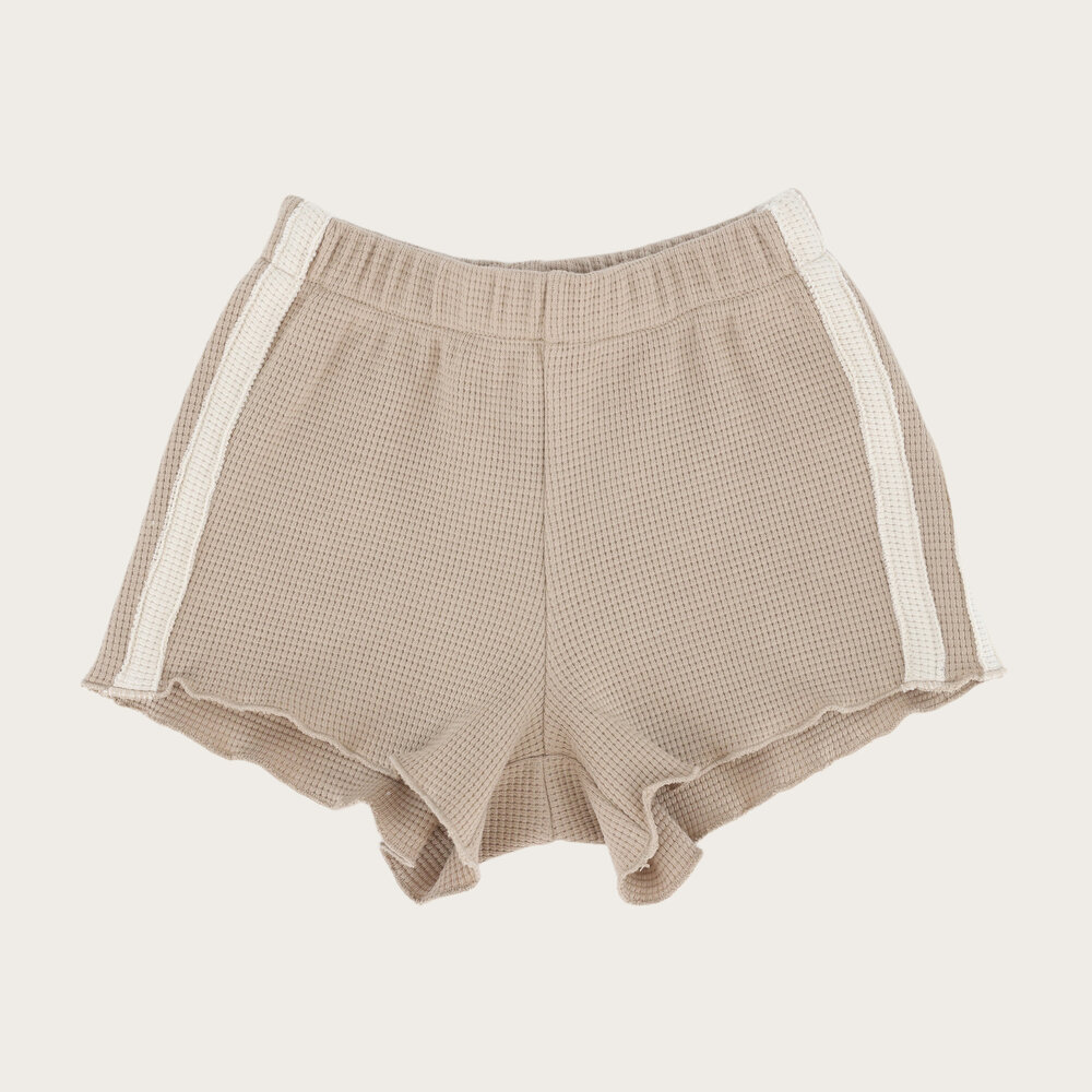 The Littlecuties short beige met witte bies
