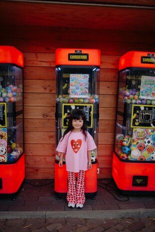 Daily Brat roze flared broek met hartjesprint