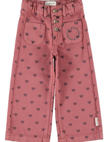 Piupiuchick flare trousers | pink w/ black hearts