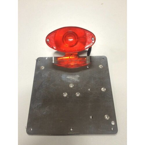 Universal plate holder including tail light