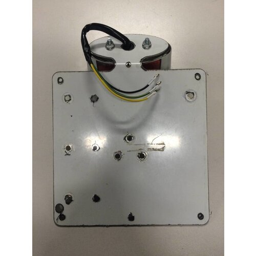 Universal plate holder including tail light