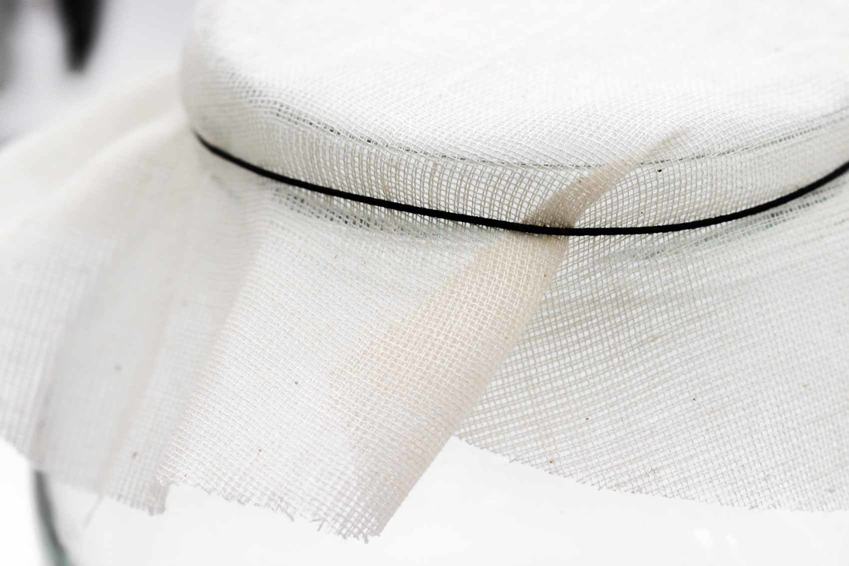 Neteldoek voor het afsluiten van de pot