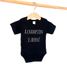 Goldengifts Romper - A champion is born! - korte mouwen - zwart Goldengifts Romper - A champion is born! - korte mouwen - zwart